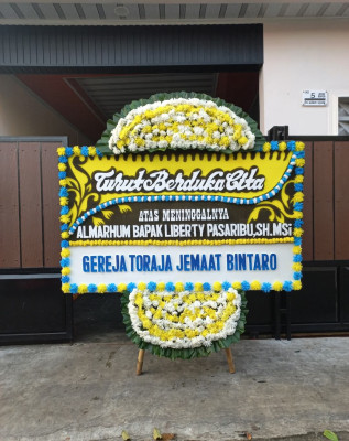 Papan Bunga Duka di Benjeng